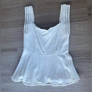 White peplum tank with crochet hem